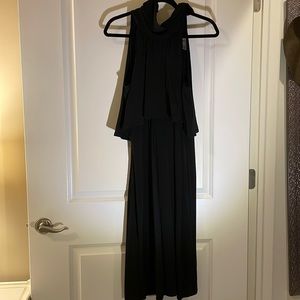 Formal black dress with halter neck, small slit in the upper back